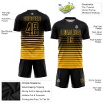 Maillot de football noir délavé, uniforme de mode par sublimation, rayures dorées personnalisées Maillot de football noir délavé, uniforme de mode par sublimation, rayures dorées personnalisées
